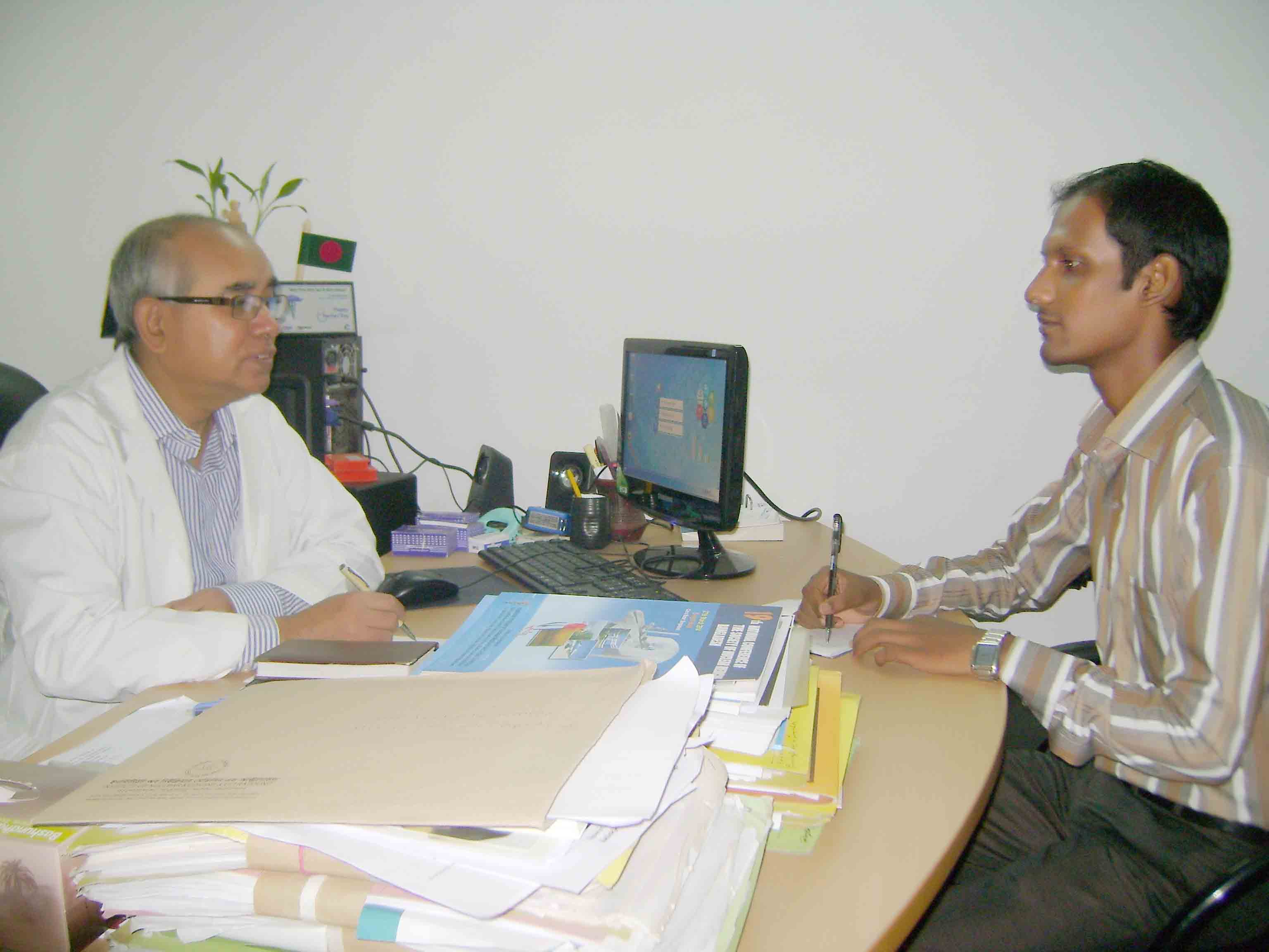 The Director is giving interview to The Guardian Reporter Abul Hasan.