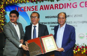 1.Chairman & Managing Director of Meghna Group of Industries Mostofa Kamal is receiving License from BEZA Executive Chairman Paban Chowdhury.